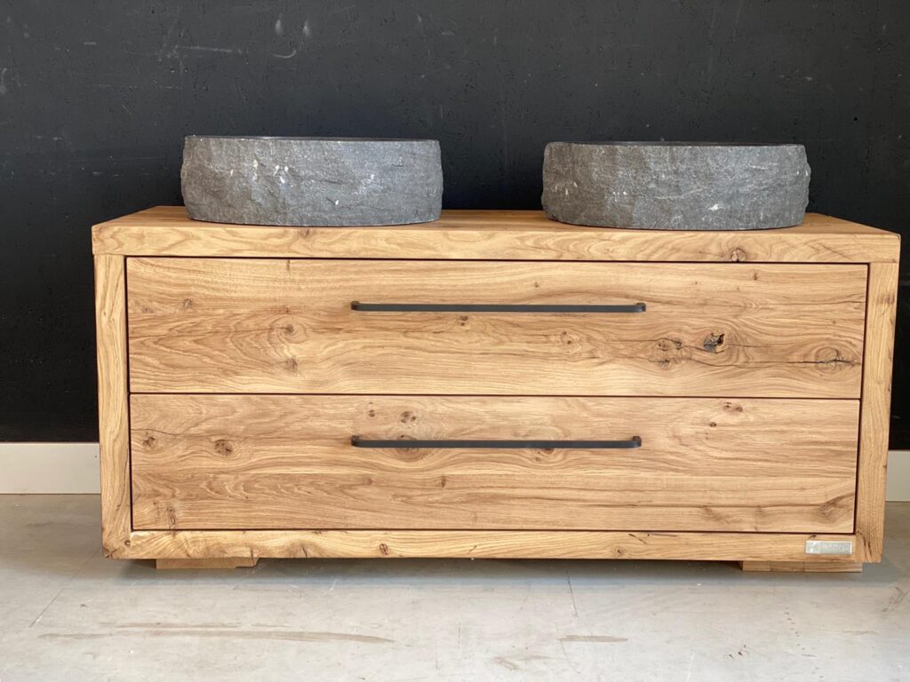 Bathroom cabinet of planed block walls with stone bowl