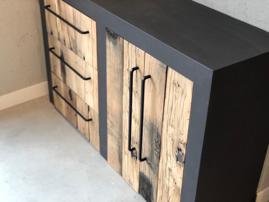 Black cabinet with door of oak wagon panels