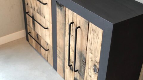 Black cabinet with door of oak wagon panels