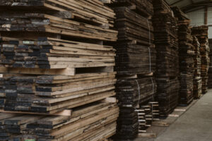 Large batch of oak wagon planks stacked