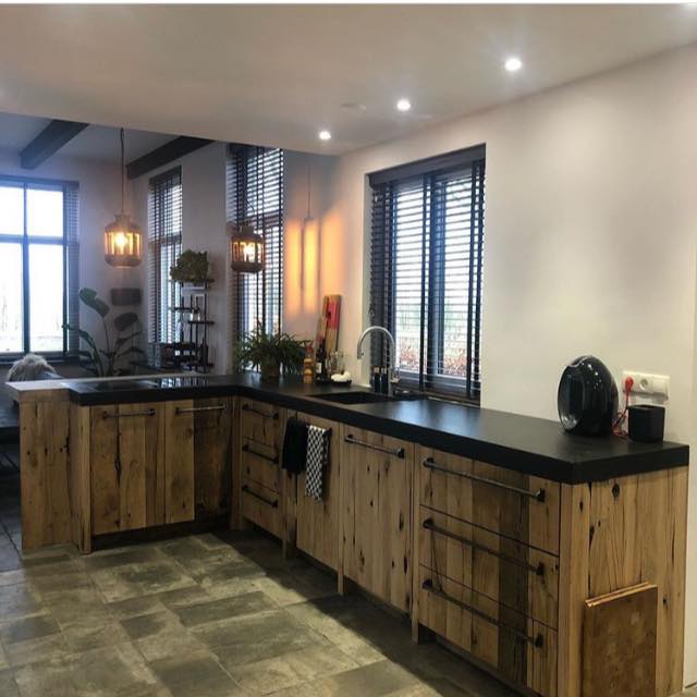 Kitchen of oak wagon planks with black top