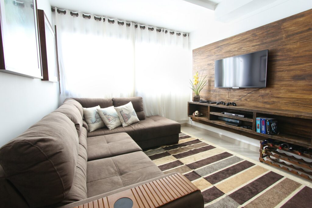 Presentation of old pine wall unit with television