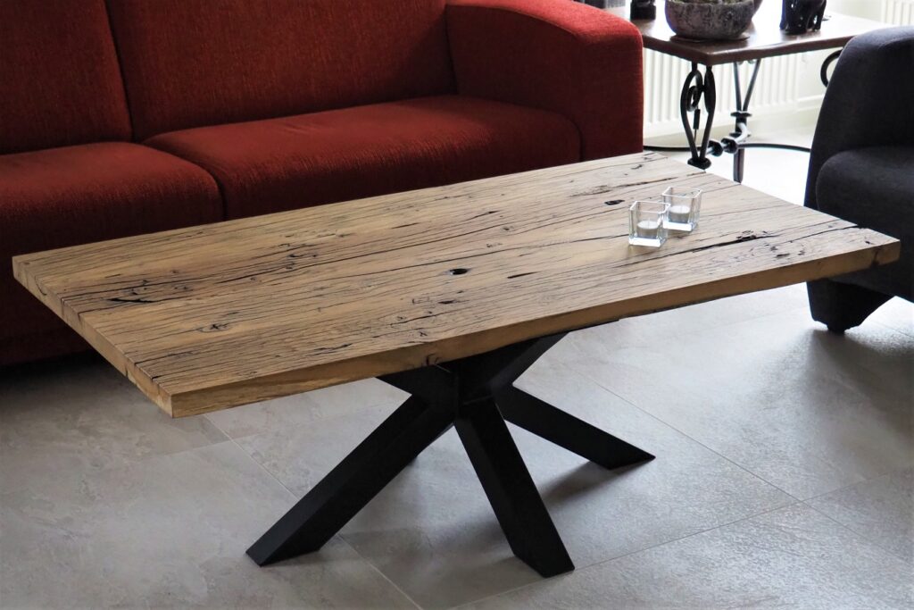 Oak wagon plank coffee table planed with black cross leg
