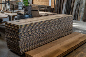 Presentation of stock of various panels in old wood shed