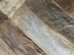Detail picture of old oak floor brushed outside herringbone laid