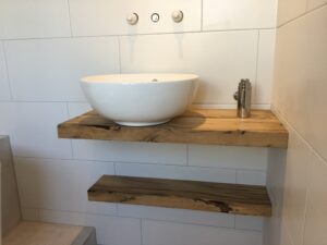Presentation toilet cabinet of planed wagon planks with fountain and faucet
