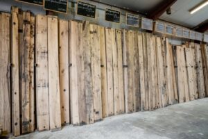 Presentation of different planed oak wagon boards in the old wood shed