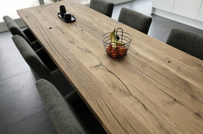 presentation table of oak wagon planks with chairs